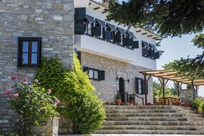 Local stones and wood from the Holy mountain Athos, are overwhelming the mansion