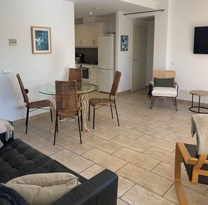 Open plan living dining room through to kitchen hen area