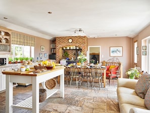 Large kitchen with Aga, two pyrolytic electric ovens, a gas hob and wine fridge