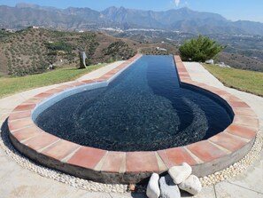 Infinity pool with view of Frigiliana