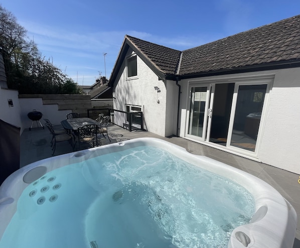 Rear patio with hot tub