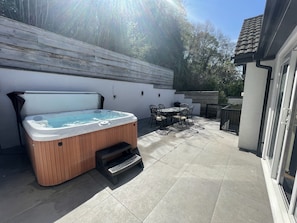 Rear patio with hot tub