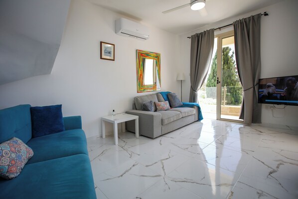 New Open Plan Lounge Furnishings, New Tiled Flooring, Curtains.