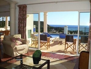 Delightful lounge opens out onto the pool terrace and has super sea views