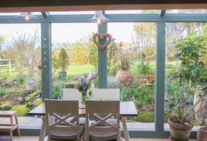 Open Plan Kitchen, With second Conservatory, views into the garden.