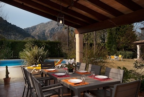 BBQ and outdoor eating area, beside the pool