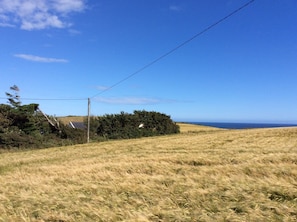 House from the rear with view of sea