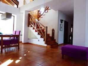 Sitting/dining area with access to first floor studio