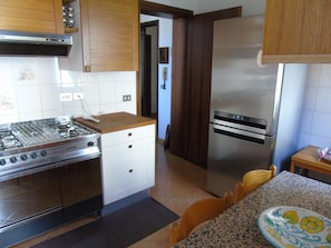 Kitchen with balcony, first floor