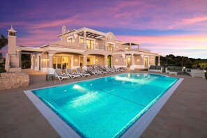 Villa and pool in the evening