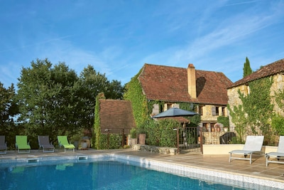 An old hillside cottage, with a beautiful pool and stunning views