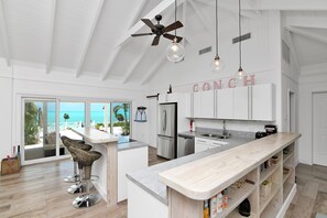 Fully fitted kitchen with bar and gorgeous ocean views