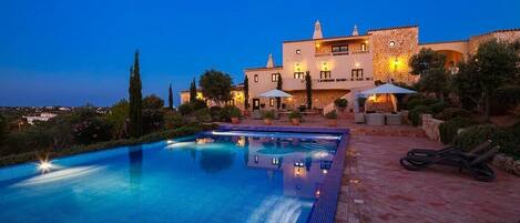 Evening pool and house view