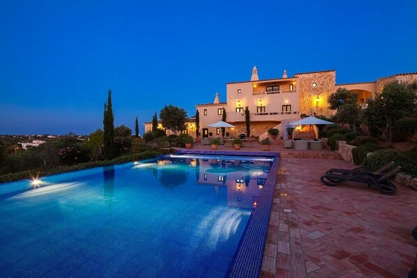 Evening pool and house view