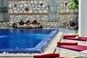 Plenty of space around the pool for sunbathing