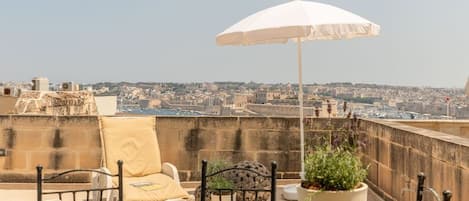 The private terrace with views of Grand Harbour and Fort Saint Angelo