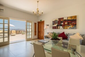 Living - Dining area leading onto private terrace with views of Grand Harbour