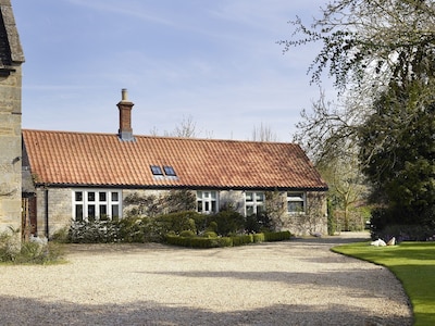 Wie in 25 Beautiful Homes gekennzeichnet, bietet das Manor Stables 4 * Komfort und Luxus