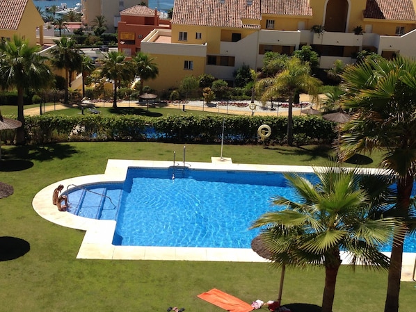 One of the pools with parasols & sunbeds