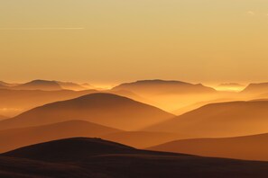 Sunset view looking west over Loch Enich from Cairngorm plateau