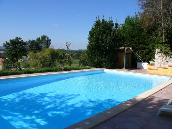 Swimming pool and pool house