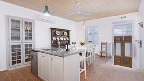 Kitchen dining room with double doors out to street