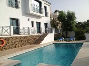 Pool and south/east face of villa