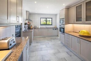 Large fully equipped kitchen