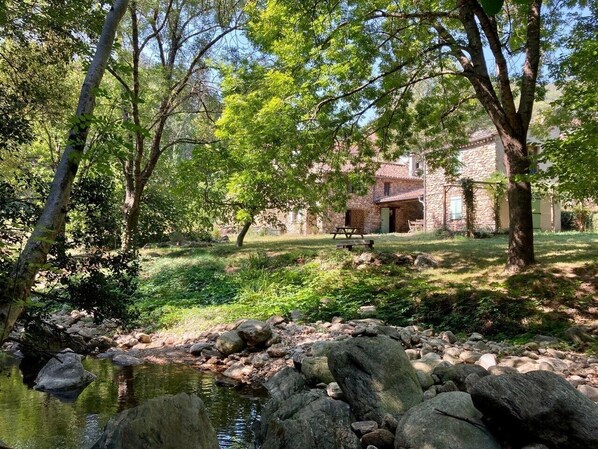 The house seen from the stream.
