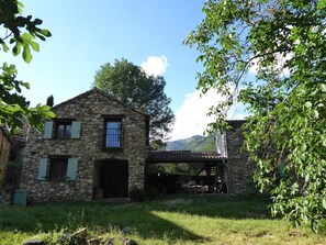 The house seen from the stream