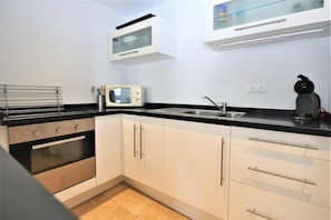 Modern kitchen is fully equipped with all the appliances
