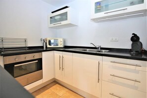 Modern kitchen is fully equipped with all the appliances