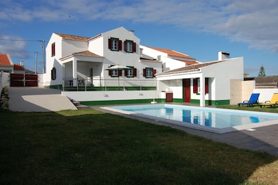 House with garden and pool