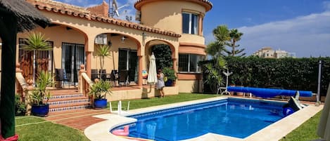 view towards villa gardens and heated swimming pool