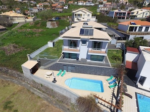 Image of the house taken from a drone.