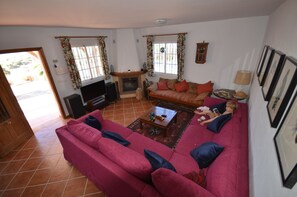 Massive sofa in living room on ground floor