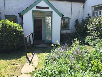 Just 10 minutes by car from Abergavenny but a rural haven on an organic farm.