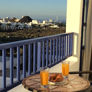 Balcony breakfast overlooking Marina Rubicon & with views of Fuerteventura