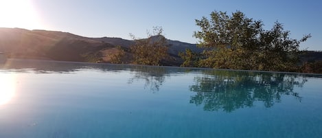 sunset on infinity pool