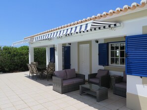 Sun awnings provide shade to seating & dinning areas