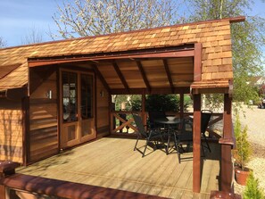 Lodge covered front deck side view