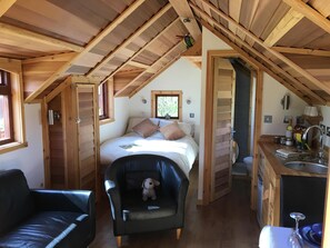 Lodge interior, looking towards bed & bathroom