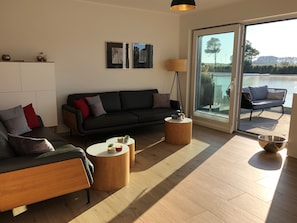 Wohnzimmer, Pfahlhaus Perle am Yachthafen