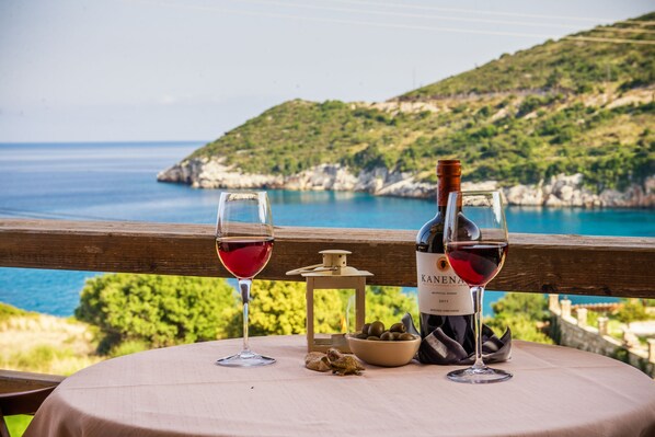 enjoy your balcony view at Makris Gialos Suites