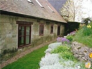 The flowery Bank behind The Stables