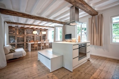 Stay half-timbered house from the 18th Century, modern design, river access in Monschau