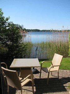 Idyllic holiday home in Timmdorf on a lake plot with its own lake access