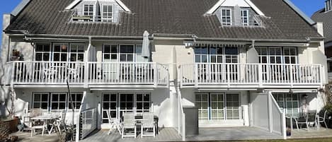 Ferienhaus mit Balkon, Sonnenterrasse, Gartenanteil