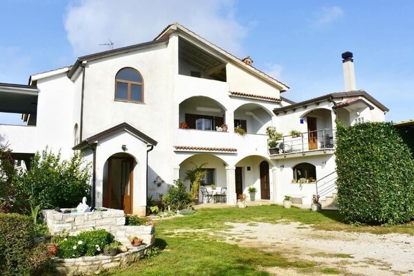 The beautiful house on the estate with a huge garden