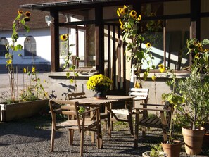Patio with sitting-area, in the evening